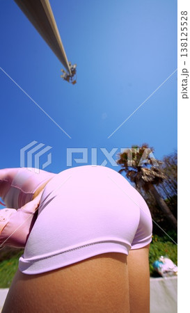 Vibrant outdoor gym session featuring influencer in colorful attire Vibrant outdoor gym session featuring influencer in colorful attire 138125528