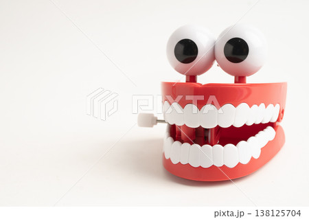 Funny red teeth with eye toy denture model for dental health care. Funny red teeth with eye toy denture model for dental health care. 138125704