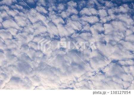 Altocumulus cloud formation creating textured mackerel sky atmospheric pattern 138127054