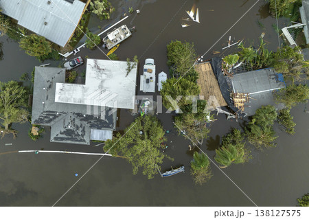 Flooded houses by hurricane Ian rainfall in Florida residential area. Consequences of natural disaster 138127575