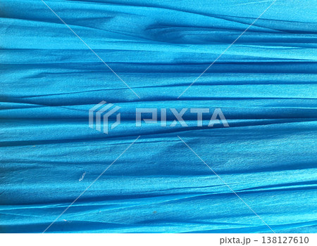 Texture of bright blue corrugated paper with horizontal folds. Rich background for creativity, design, packaging Texture of bright blue corrugated paper with horizontal folds. Rich background for creativity, design, packaging 138127610