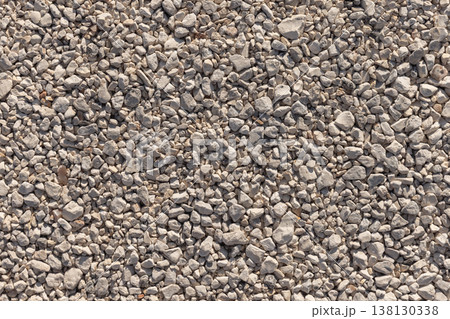 Closeup aerial view of light-colored gravel, background Closeup aerial view of light-colored gravel, background 138130338