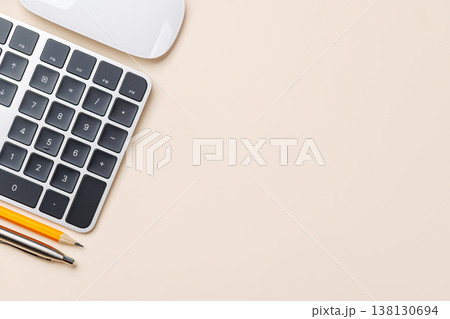 Office supplies on beige desk Office supplies on beige desk 138130694
