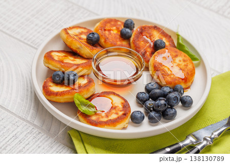 Homemade pancakes with blueberries and syrup 138130789