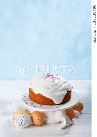 Traditional Easter cake decorated with colorful icing and sprinkles, symbolizing the festive spirit Traditional Easter cake decorated with colorful icing and sprinkles, symbolizing the festive spirit 138130790