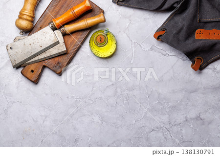 Meat cooking utensils on marble table 138130791