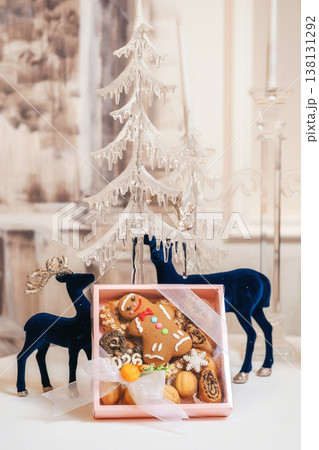 Holiday Treat Packaging. Decorative Present Ensemble Featuring Baked Goods And Winter Accents 138131292