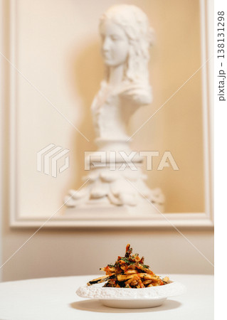 Refined Culinary Presentation Featuring Creamy Tagliatelle Amidst Artistic And Heritage Surroundings 138131298