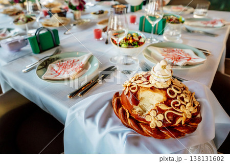 Celebrate Special Occasion With Intricate Bread And Elegant Dining Table Arrangement Celebrate Special Occasion With Intricate Bread And Elegant Dining Table Arrangement 138131602