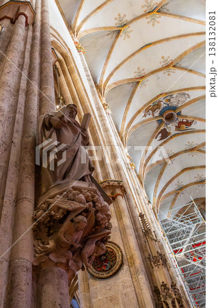 Interior view of Ulm Cathedral in Germany. Features ornate ceiling, detailed stone carvings, and stained glass windows. Gothic architecture highlights Interior view of Ulm Cathedral in Germany. Features ornate ceiling, detailed stone carvings, and stained glass windows. Gothic architecture highlights 138132081