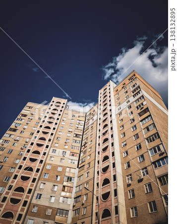 Urban apartment building with geometric facade. 138132895