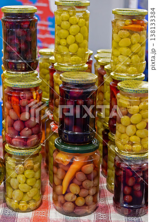 Colorful pickled vegetables in jars Colorful pickled vegetables in jars 138133384