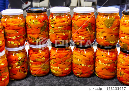 Fermented vegetables in glass jars 138133457