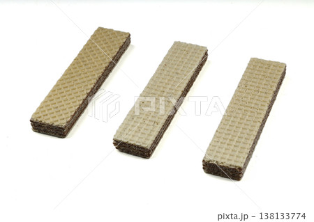 Long wafer stick with hazelnut cream isolated on white background 138133774