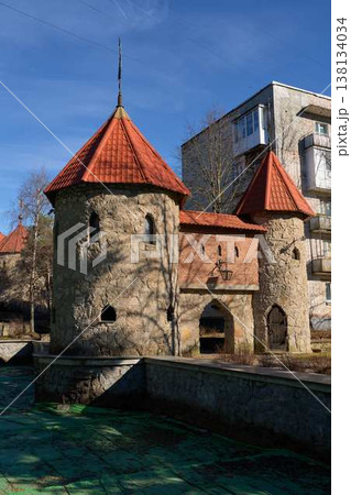Photographic Depiction Of Conical Roof Turret With Ornate Ridge Detail And Vivid Blue Sky Background 138134034