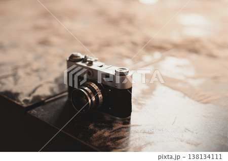Scene of aged film camera with rustic character and mood 138134111