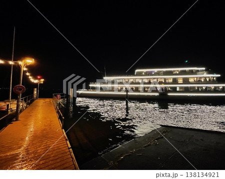 Boat on Zurich Lake at Night with Reflections Boat on Zurich Lake at Night with Reflections 138134921