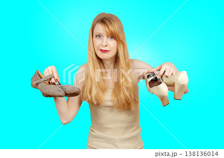 Woman showing shoes to wear 138136014