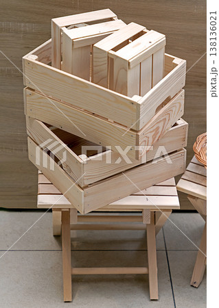 Empty wooden crates in corner 138136021