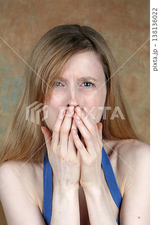Female showing disgust expression on her face Female showing disgust expression on her face 138136022