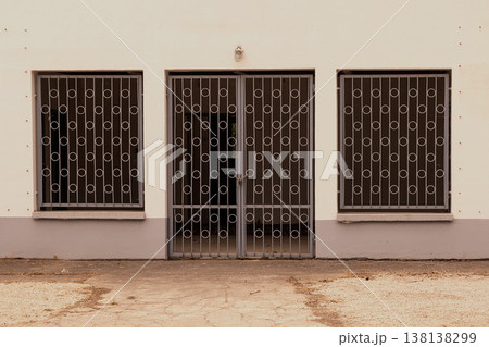 Closed metal fence on house Closed metal fence on house 138138299
