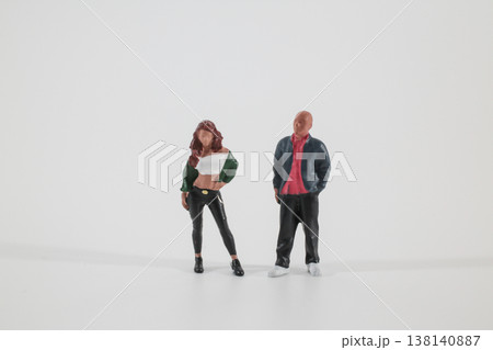 Two Miniature Figures Standing Together in Studio Scene Two Miniature Figures Standing Together in Studio Scene 138140887