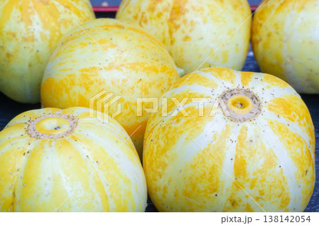 Round zucchini in a shop window Round zucchini in a shop window 138142054