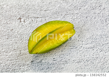 Fresh starfruit or carambola on a textured background. Fresh starfruit or carambola on a textured background. 138142552