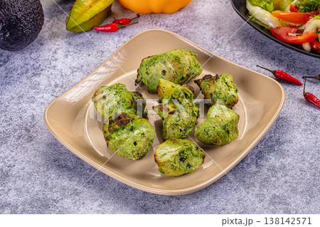 Indian Hariyali Chicken Mint green Tikka Kebab with Fresh Vegetable Salad Indian Hariyali Chicken Mint green Tikka Kebab with Fresh Vegetable Salad 138142571