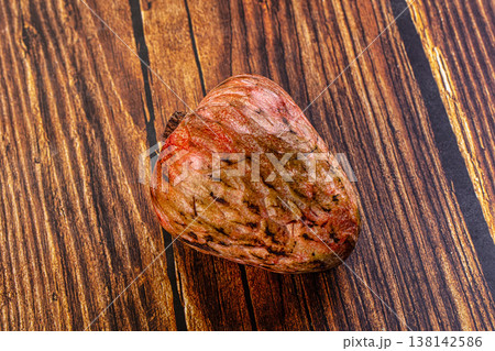 Exotic cherimoya fruit on a wooden table background 138142586