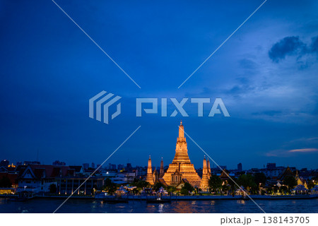 Bangkok, Thailand - June 11, 2025: Pagoda at Wat Arun, or Wat Arun Ratchawararam, is a tourist landmark near the Chao Phraya River in Bangkok,Thailand. Bangkok, Thailand - June 11, 2025: Pagoda at Wat Arun, or Wat Arun Ratchawararam, is a tourist landmark near the Chao Phraya River in Bangkok,Thailand. 138143705