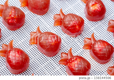 Homemade Fruit Jelly with Dried Strawberry Inside in Pineapple Shape 138144506