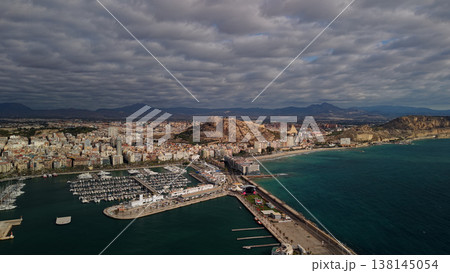 Aerial panoramic view of Alicante marina, Santa Barbara castle and Mediterranean coastline in Spain Aerial panoramic view of Alicante marina, Santa Barbara castle and Mediterranean coastline in Spain 138145054
