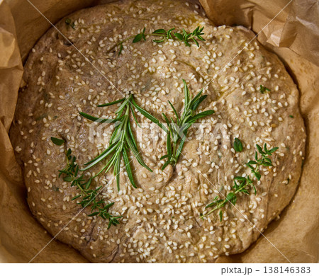 Rustic Focaccia Dough with Herbs and Sesame Seeds 138146383