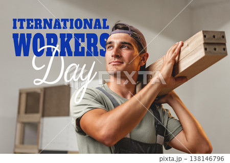 Celebration of International Workers Day with a worker carrying wood on May 1 Celebration of International Workers Day with a worker carrying wood on May 1 138146796