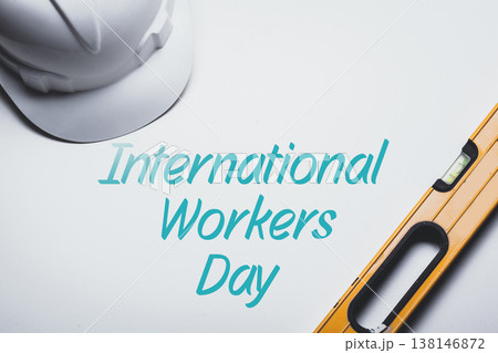 Celebrating International Workers Day on May 1 with hard hats and tools at work sites Celebrating International Workers Day on May 1 with hard hats and tools at work sites 138146872