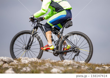 Close-up of mountain biker Close-up of mountain biker 138147414