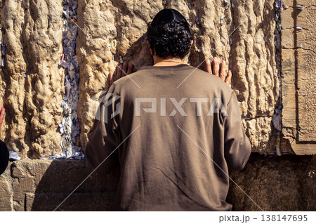 Jewish men in prayer at the Western Wall, Jerusalem Jewish men in prayer at the Western Wall, Jerusalem 138147695