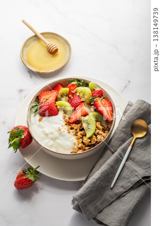 Healthy yogurt bowl with granola and fresh berries for clean eating diet Healthy yogurt bowl with granola and fresh berries for clean eating diet 138149739