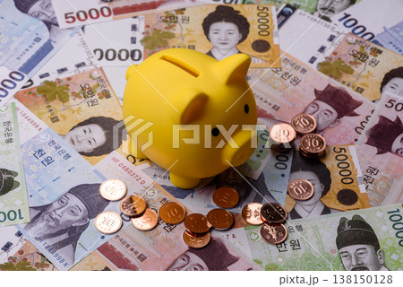 A piggy bank as a concept for storing, accumulating, and saving financial resources. A piggy bank A piggy bank as a concept for storing, accumulating, and saving financial resources. A piggy bank 138150128