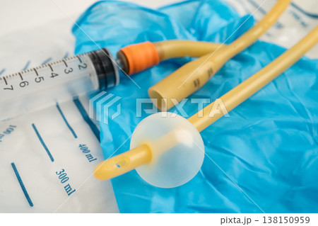 Foley urinary catheter with urine bag for disability or patient in hospital. Foley urinary catheter with urine bag for disability or patient in hospital. 138150959
