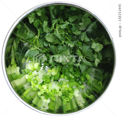 Fresh Chopped Cilantro and Spring Onion Mix Prepared in a Stainless Steel Bowl for Cooking, Garnishing, and Flavoring Various Dishes Fresh Chopped Cilantro and Spring Onion Mix Prepared in a Stainless Steel Bowl for Cooking, Garnishing, and Flavoring Various Dishes 138151445