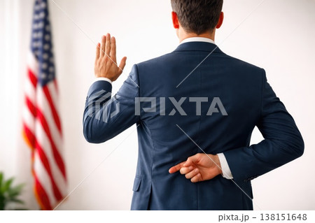 Businessman making oath with fingers crossed behind back and American flag Businessman making oath with fingers crossed behind back and American flag 138151648