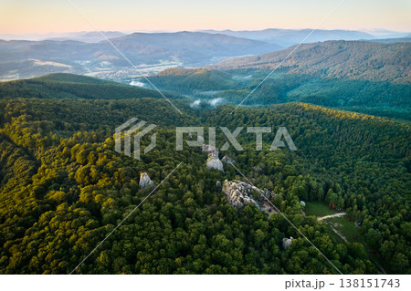 Beautiful panorama of alpine forest with green foliage, rocks and mountain slopes. Dovbush Rocks, Carpathian mountains, Ukraine. Beautiful panorama of alpine forest with green foliage, rocks and mountain slopes. Dovbush Rocks, Carpathian mountains, Ukraine. 138151743