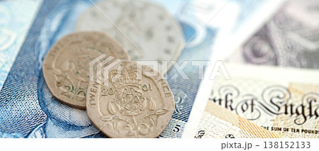Coins and banknotes of United Kingdom and Great Britain pound currency. UK money close up. Business, economy and finance concept 138152133