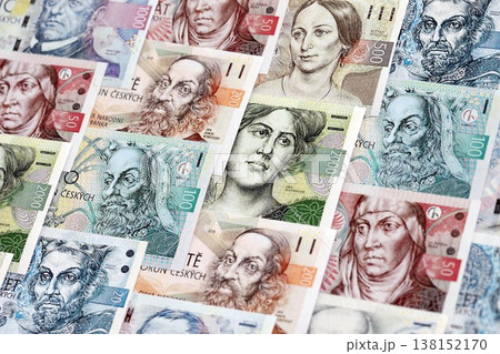 Czech koruna paper banknotes pile on table. Czech Republic CZK currency money bills in big amount. Concept of economics, taxation and banking in Czech Republic 138152170