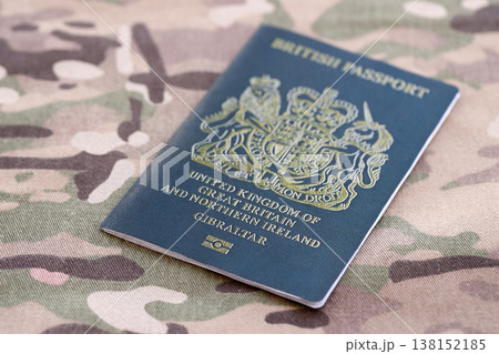 Gibraltar passport on table close up. Official identification document book for citizens of Gibraltar. Concept of travel and tourism Gibraltar passport on table close up. Official identification document book for citizens of Gibraltar. Concept of travel and tourism 138152185