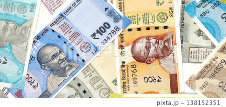 Big pile of Indian Rupees money bills banknotes close up. Lots of money of Indian INR currency cash in big bunch. Economics and business in India 138152351