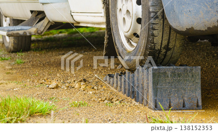 Camper leveling block in use. Camper leveling block in use. 138152353