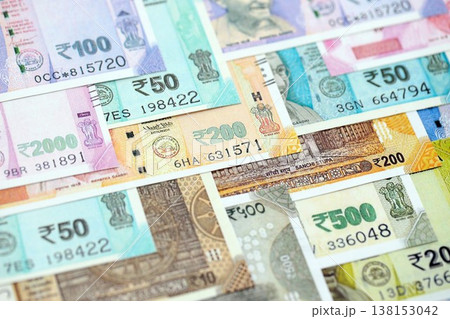 Big pile of Indian Rupees money bills banknotes close up. Lots of money of Indian INR currency cash in big bunch. Economics and business in India Big pile of Indian Rupees money bills banknotes close up. Lots of money of Indian INR currency cash in big bunch. Economics and business in India 138153042